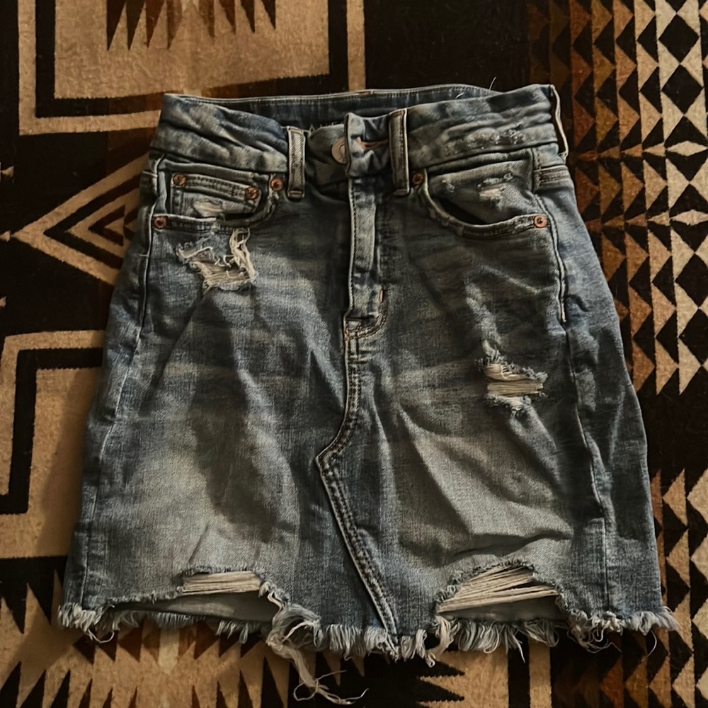 High rise distress jean mini skirt